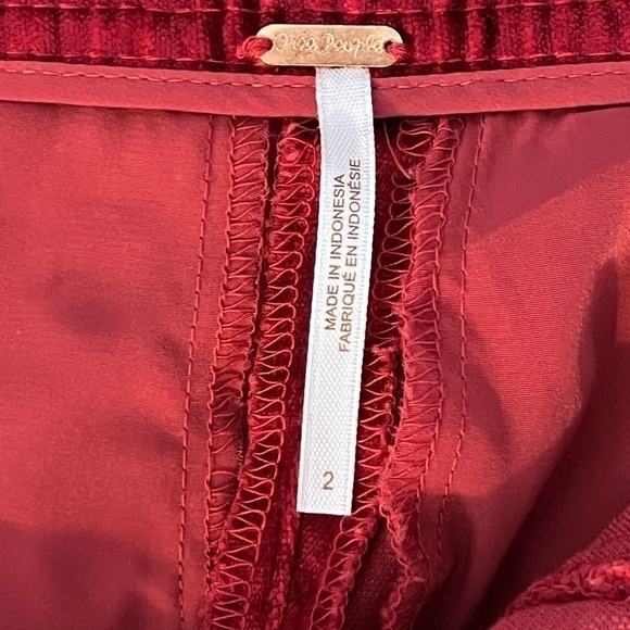 Free People Walk With You Velvet Flare Trouser
Pants in Cherry Juice - Picture 9 of 10